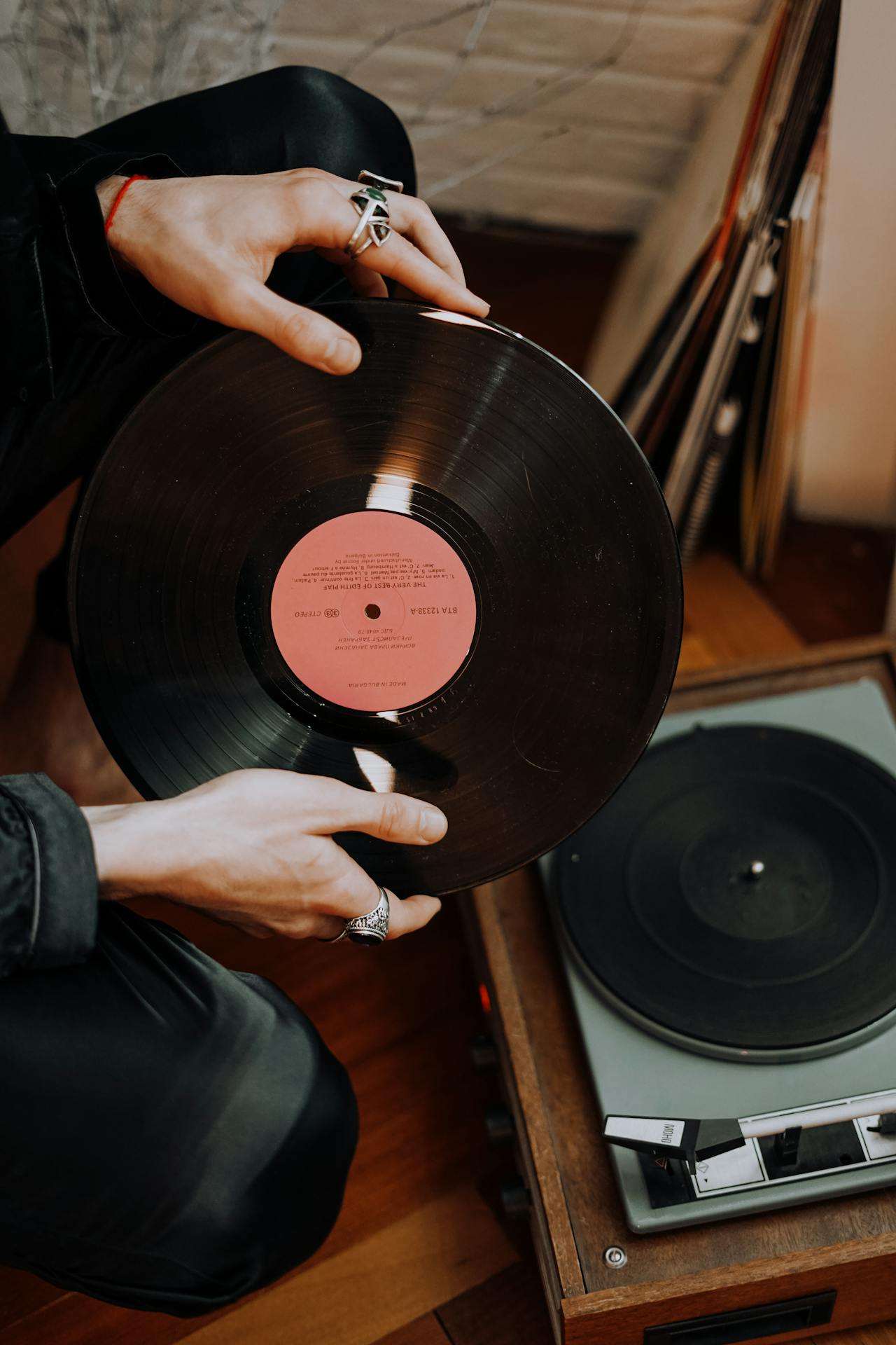 Music-Contact-Page-What-We-Are-About-Woman-Holding-Records